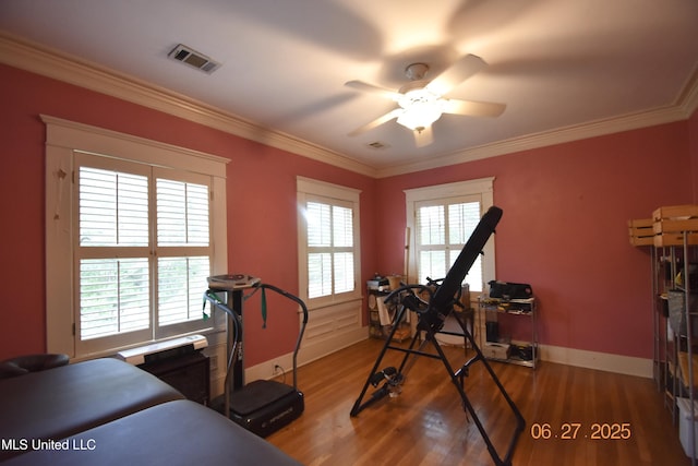 1211 River Rd, Greenwood, MS 38930 - exercise area featuring a ceiling fan, wood finished floors, and crown molding