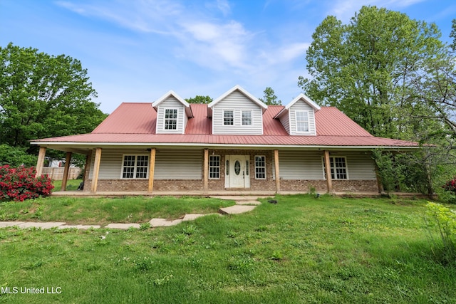 9640 Barbee Rd, Hernando, MS 38632 - farmhouse-style home featuring brick siding, a front yard, and metal roof