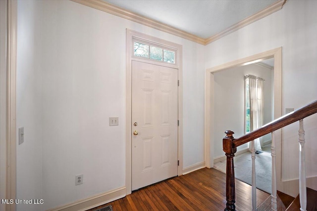 entryway featuring crown molding and dark hardwood / wood-style floors