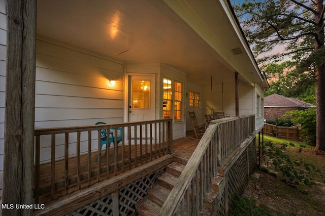 view of exterior entry at dusk