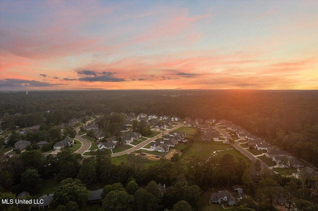 view of aerial view at dusk