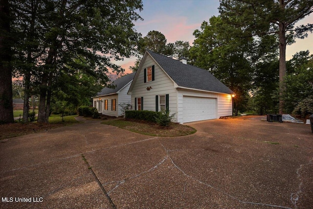 exterior space with a garage