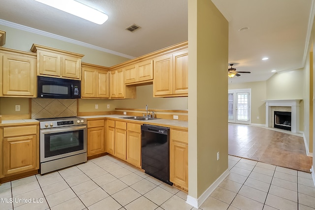 kitchen featuring light hardwood / wood-style flooring, sink, black appliances, crown molding, and light brown cabinetry