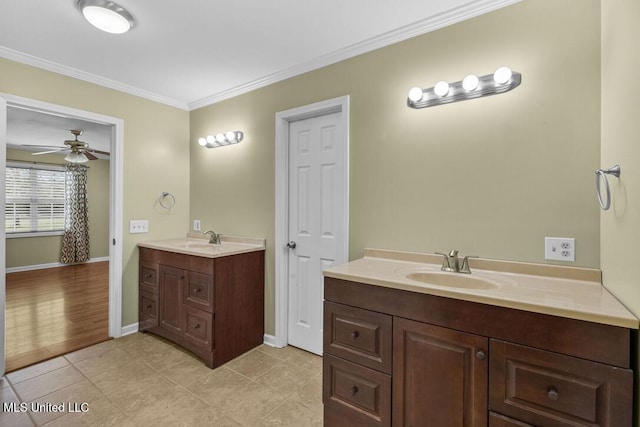 1144 Little Big Mound Rd, Bentonia, MS 39040 - bathroom with tile patterned flooring, vanity, ornamental molding, baseboards, and a ceiling fan