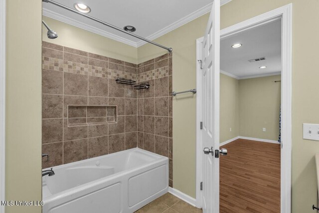 1144 Little Big Mound Rd, Bentonia, MS 39040 - bathroom featuring shower / bath combination, crown molding, baseboards, and visible vents