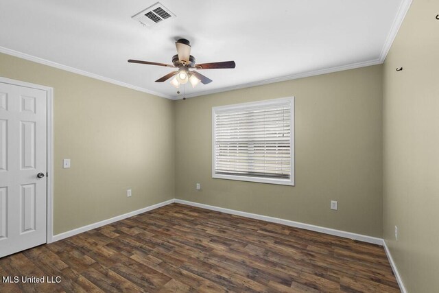 1144 Little Big Mound Rd, Bentonia, MS 39040 - spare room with visible vents, baseboards, ceiling fan, ornamental molding, and dark wood-style floors