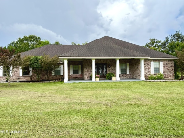 706 Anchor Lake Rd, Carriere, MS 39426 - view of front of property with a front lawn, brick siding, and roof with shingles