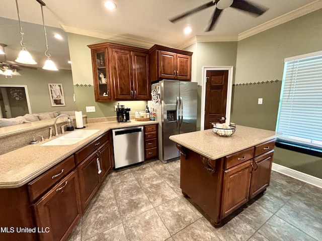 706 Anchor Lake Rd, Carriere, MS 39426 - kitchen featuring stainless steel appliances, ceiling fan, crown molding, light countertops, and glass insert cabinets