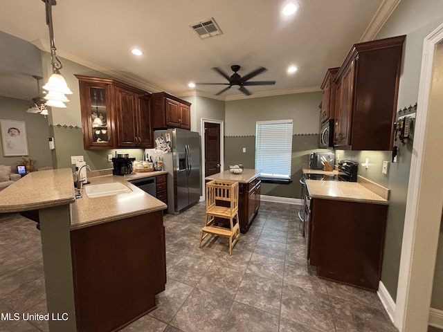 706 Anchor Lake Rd, Carriere, MS 39426 - kitchen with appliances with stainless steel finishes, ceiling fan, a peninsula, crown molding, and light countertops