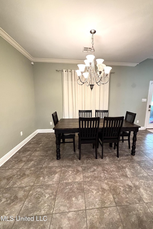 706 Anchor Lake Rd, Carriere, MS 39426 - dining area with ornamental molding and a chandelier