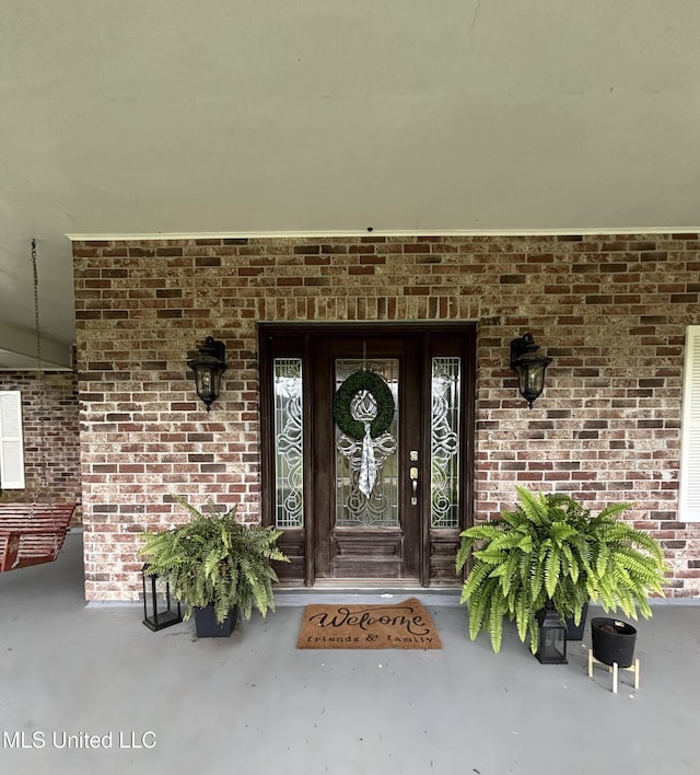 706 Anchor Lake Rd, Carriere, MS 39426 - view of exterior entry with brick siding