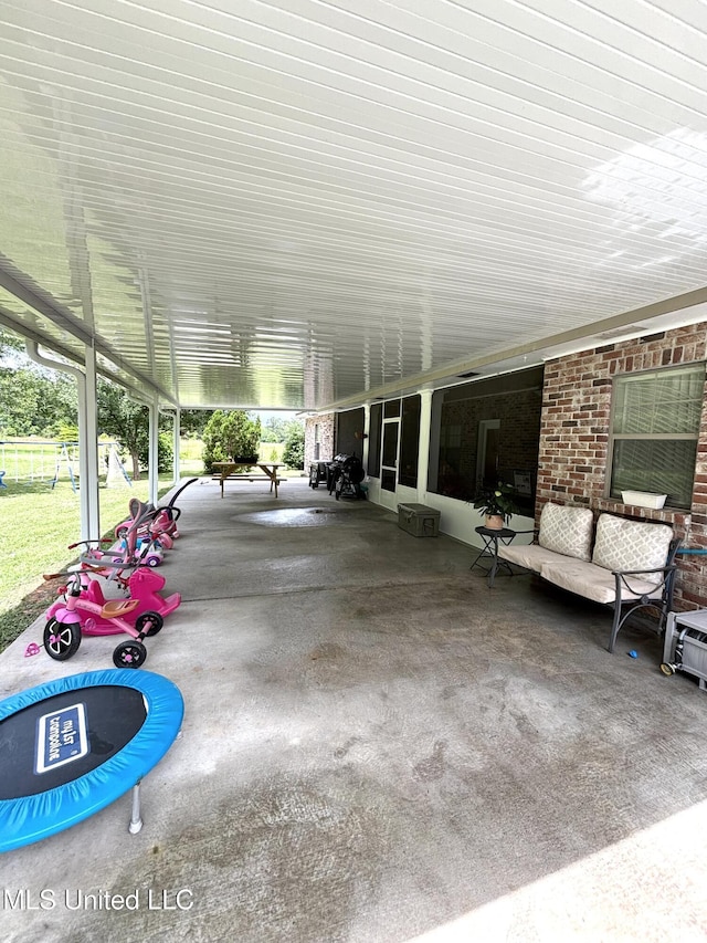 706 Anchor Lake Rd, Carriere, MS 39426 - view of patio / terrace with a carport