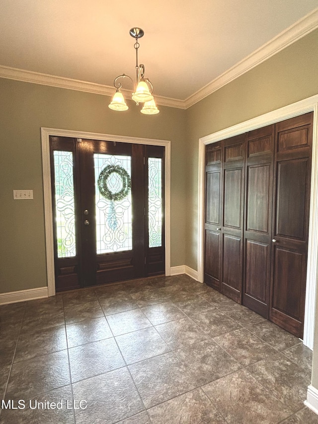 706 Anchor Lake Rd, Carriere, MS 39426 - foyer entrance featuring a chandelier and ornamental molding