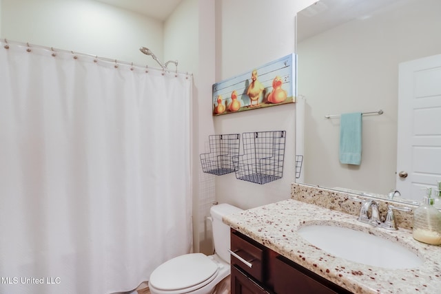 15581 Ollie Ln, Biloxi, MS 39532 - full bathroom with vanity, toilet, and a shower with curtain