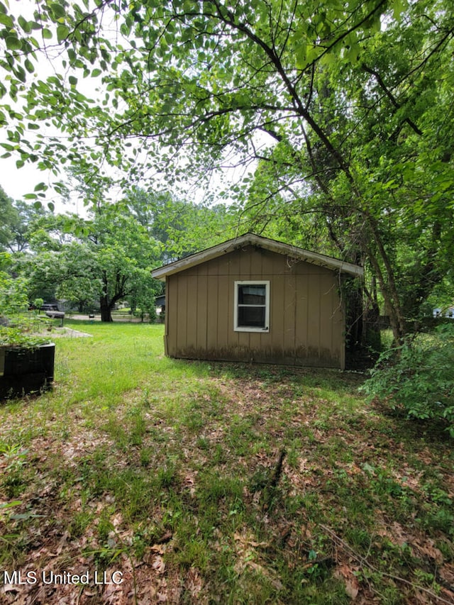 view of outbuilding with an outbuilding