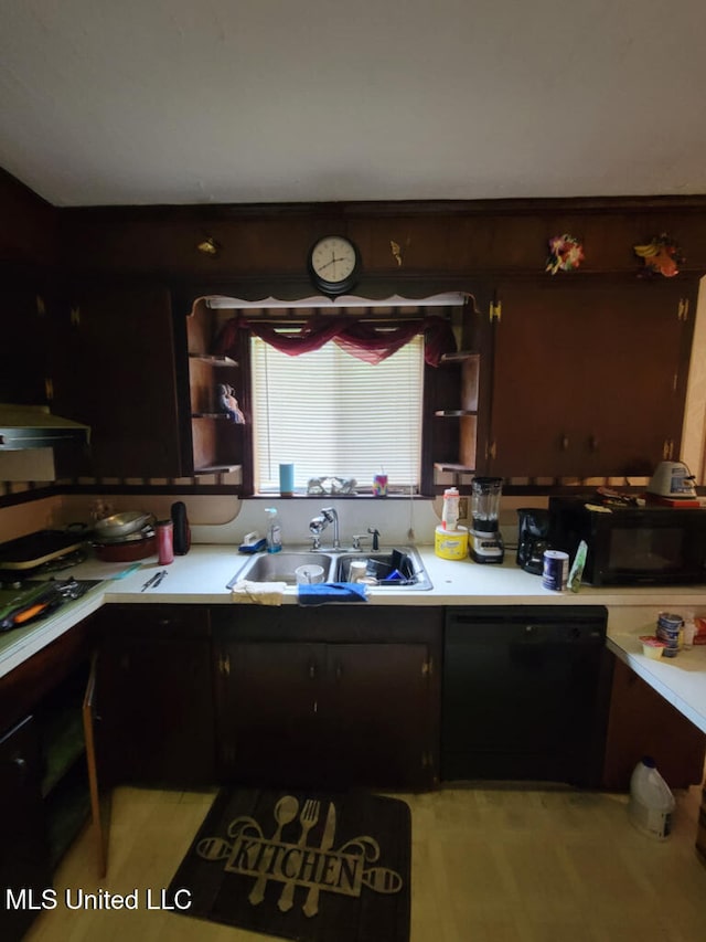 kitchen with black appliances, a sink, open shelves, and light countertops
