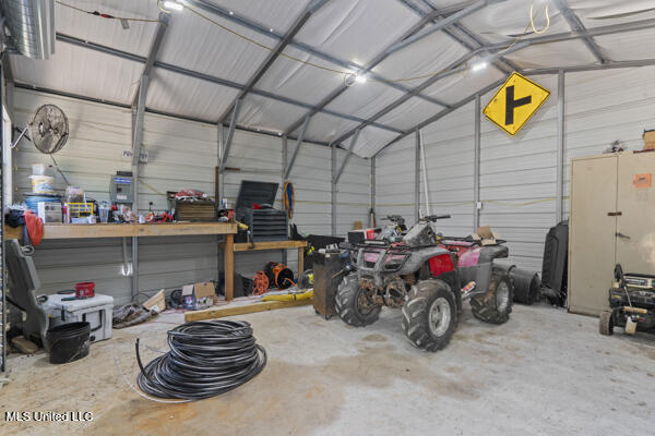 284 Osborn Moody Rd, Poplarville, MS 39470 - garage with metal wall