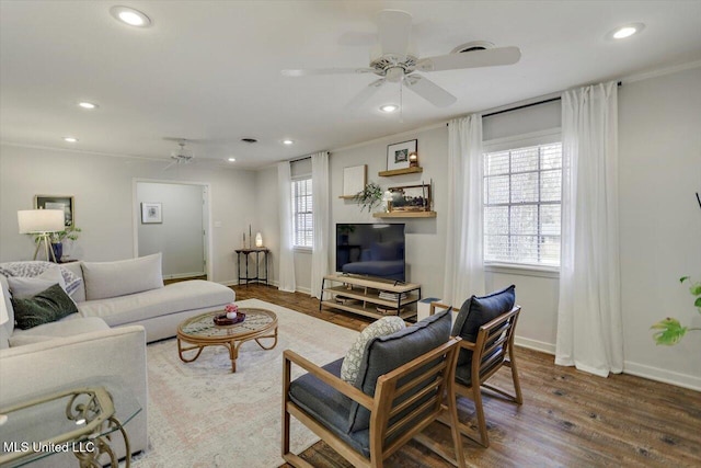 living room featuring recessed lighting, a ceiling fan, a wealth of natural light, and wood finished floors