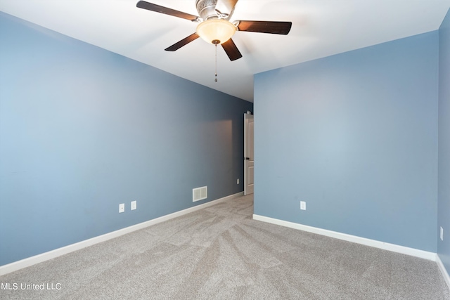 carpeted empty room with ceiling fan