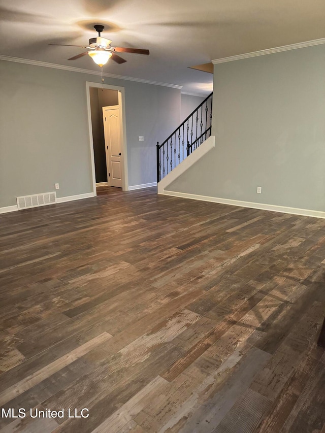 spare room with crown molding, dark hardwood / wood-style floors, and ceiling fan