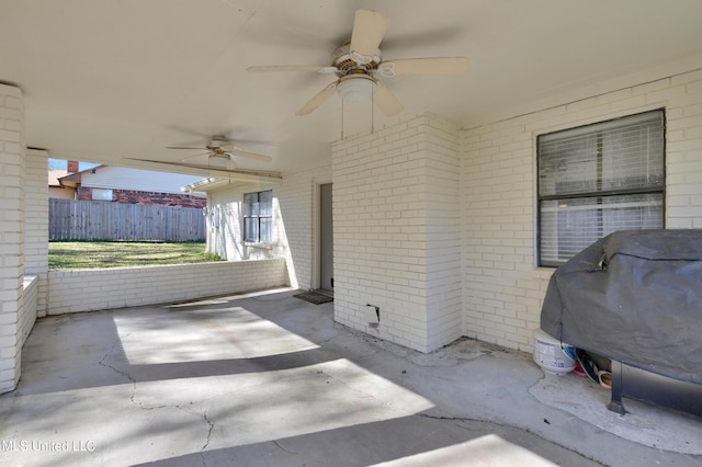 view of patio / terrace with ceiling fan and area for grilling