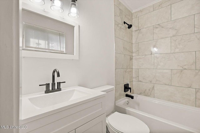 1399 Dorgan St, Jackson, MS 39204 - full bathroom featuring tiled shower / bath combo, toilet, ornamental molding, and vanity