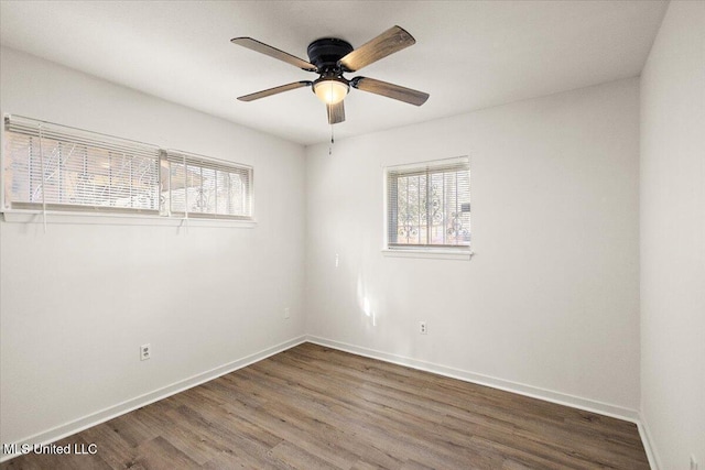 1399 Dorgan St, Jackson, MS 39204 - spare room featuring dark hardwood / wood-style flooring and ceiling fan