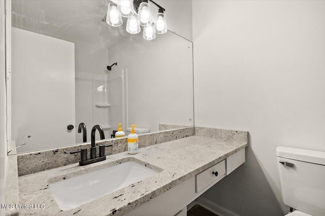 1399 Dorgan St, Jackson, MS 39204 - bathroom with vanity and toilet