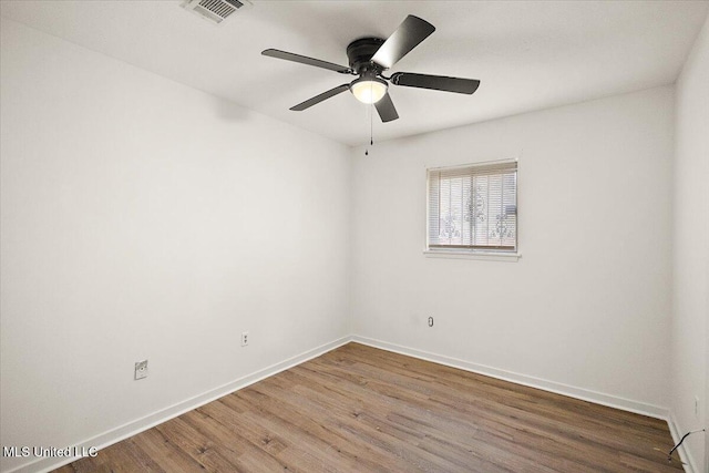 1399 Dorgan St, Jackson, MS 39204 - unfurnished room with ceiling fan and dark hardwood / wood-style floors