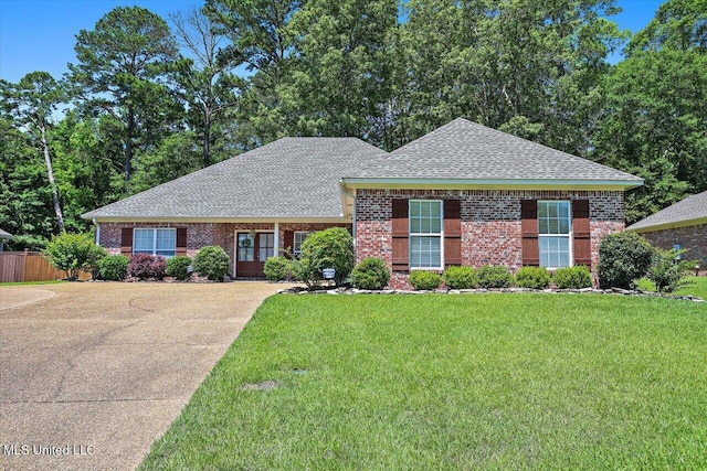 115 Victoria Pl, Brandon, MS 39042 - view of front of home with a shingled roof and brick siding
