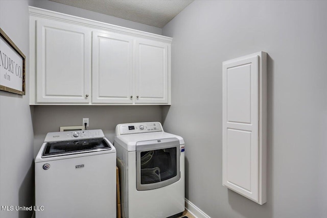 115 Victoria Pl, Brandon, MS 39042 - laundry area featuring cabinet space and washer and dryer