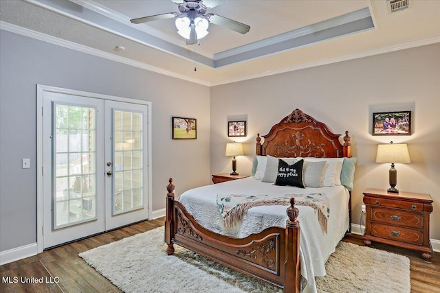 115 Victoria Pl, Brandon, MS 39042 - bedroom featuring french doors, a raised ceiling, access to outside, wood finished floors, and crown molding