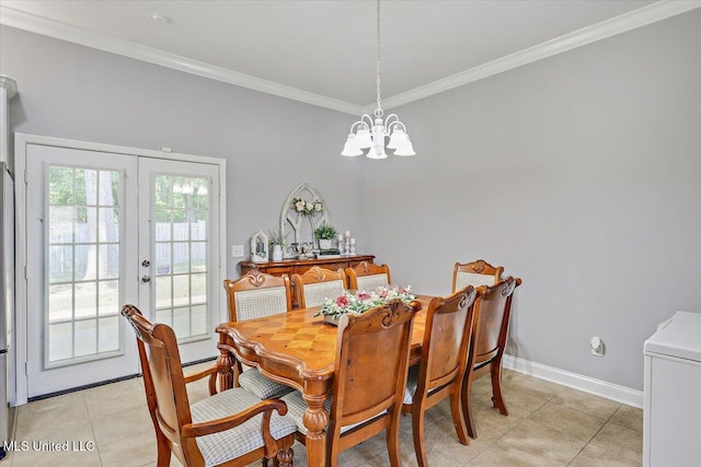 115 Victoria Pl, Brandon, MS 39042 - dining area featuring a chandelier, crown molding, baseboards, french doors, and light tile patterned floors