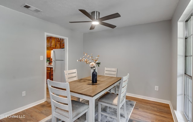 114 Fern Valley Rd, Brandon, MS 39042 - dining area with ceiling fan, light wood-style floors, and baseboards