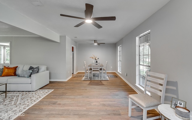 114 Fern Valley Rd, Brandon, MS 39042 - living area with a ceiling fan, plenty of natural light, light wood-style floors, and baseboards