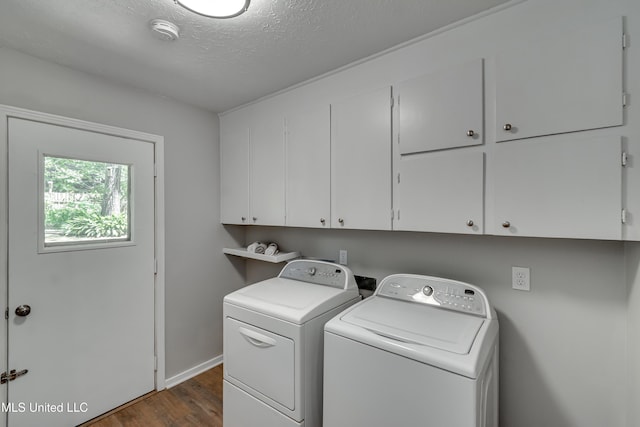 114 Fern Valley Rd, Brandon, MS 39042 - laundry area with cabinet space, separate washer and dryer, wood finished floors, a textured ceiling, and baseboards