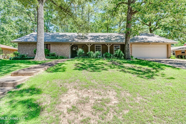114 Fern Valley Rd, Brandon, MS 39042 - ranch-style house with an attached garage, a front lawn, concrete driveway, and brick siding