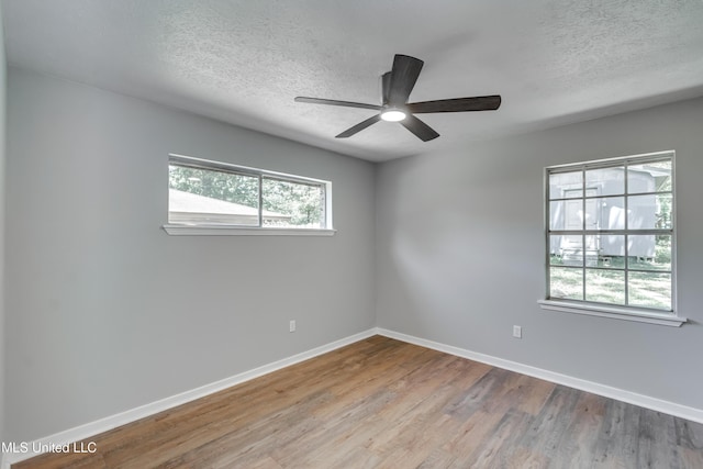 114 Fern Valley Rd, Brandon, MS 39042 - empty room with baseboards, a textured ceiling, wood finished floors, and ceiling fan