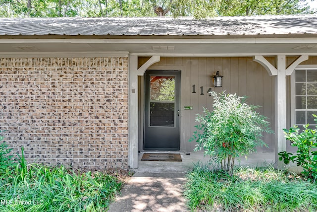 114 Fern Valley Rd, Brandon, MS 39042 - doorway to property with metal roof