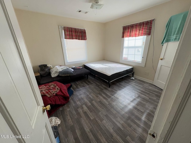 bedroom featuring hardwood / wood-style floors