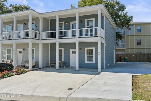 view of front of house with a balcony