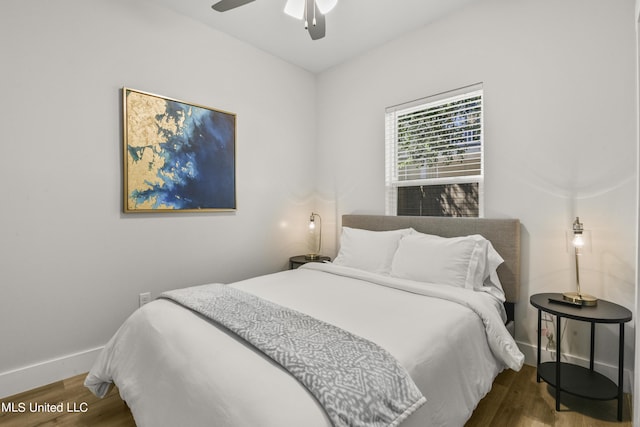 56 Oak Alley Ln, Long Beach, MS 39560 - bedroom featuring wood finished floors, baseboards, and a ceiling fan