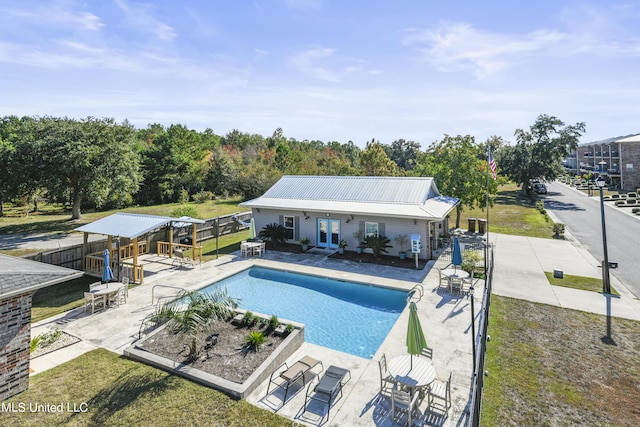 56 Oak Alley Ln, Long Beach, MS 39560 - view of pool with fence, french doors, and a patio area