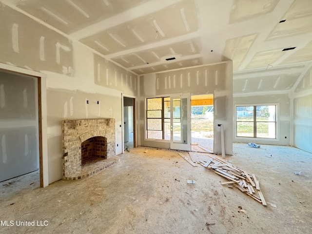 unfurnished living room featuring a fireplace