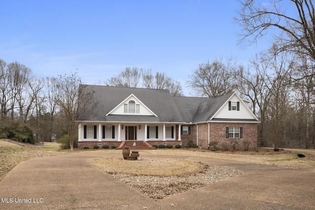 view of front of property featuring covered porch