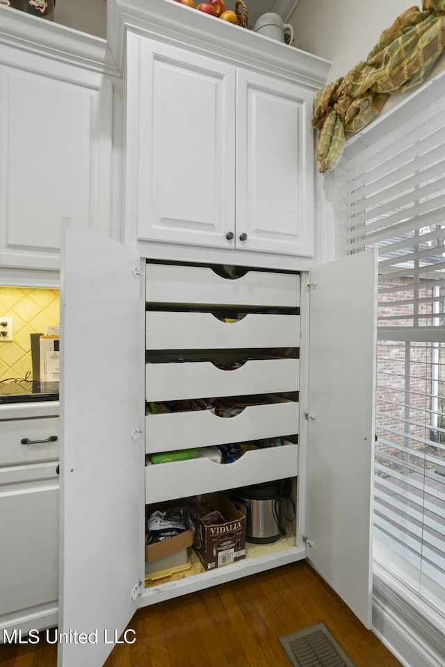 mudroom with dark wood-type flooring