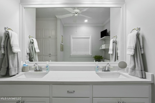 bathroom featuring ornamental molding, vanity, and ceiling fan