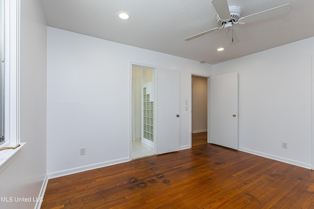 unfurnished room featuring hardwood / wood-style flooring, ceiling fan, baseboards, and recessed lighting