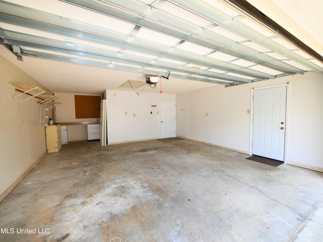 garage featuring a garage door opener