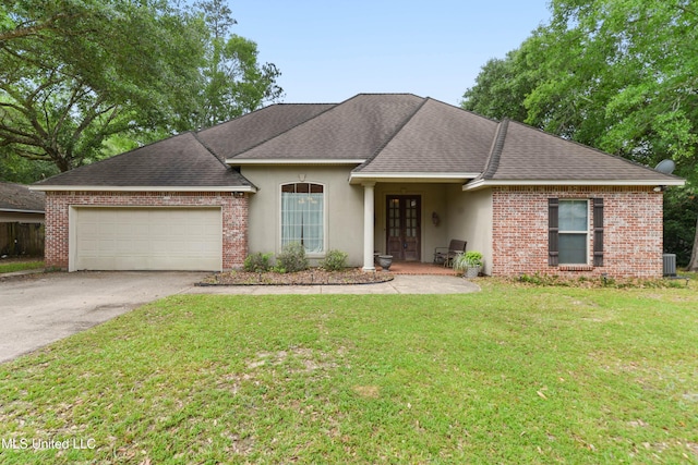 63722 N Diamondhead Dr, Diamondhead, MS 39525 - view of front of property with an attached garage, a shingled roof, concrete driveway, and stucco siding